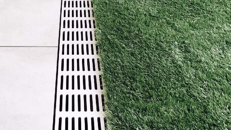 example of grates between tile and grass