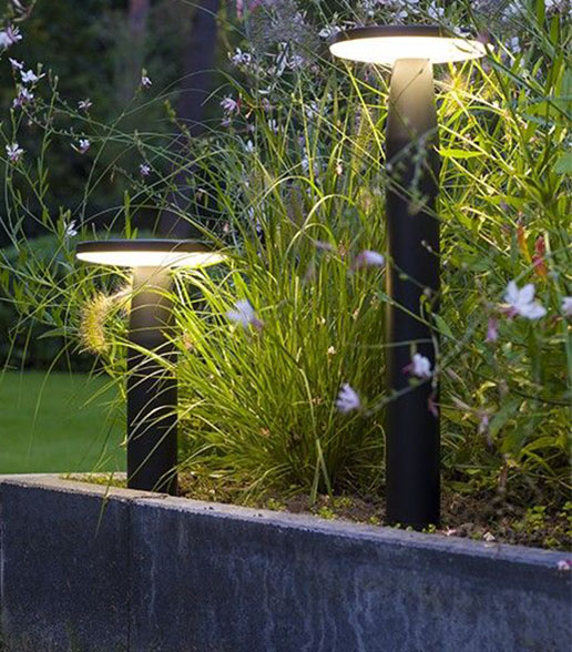 In-Lite disk low bollard beside taller one 