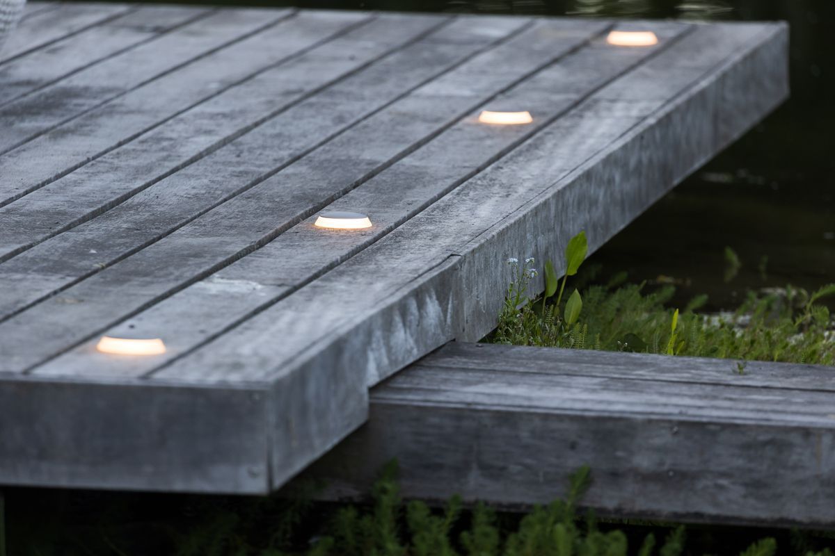 Puck light inserted into dock