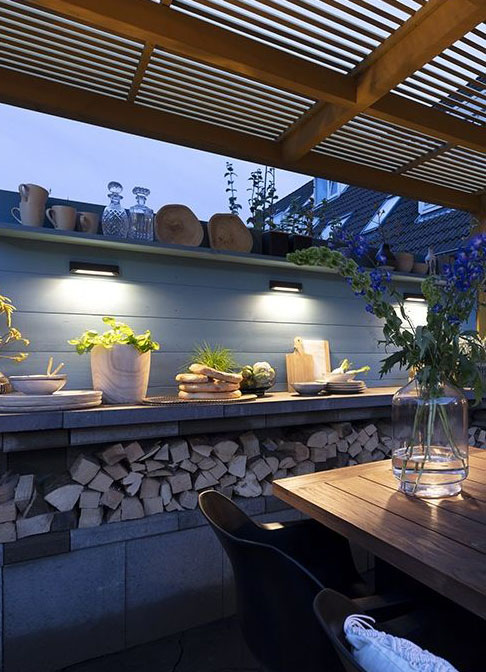 in-lite Wedge Slim 12V light installed under a shelf to illuminate a counter.