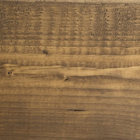 bark finish cutek sample on brown pressure treated lumber