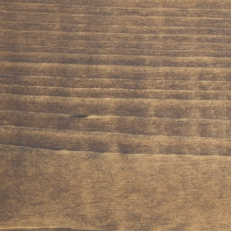 pecan finish cutek sample on brown pressure treated lumber