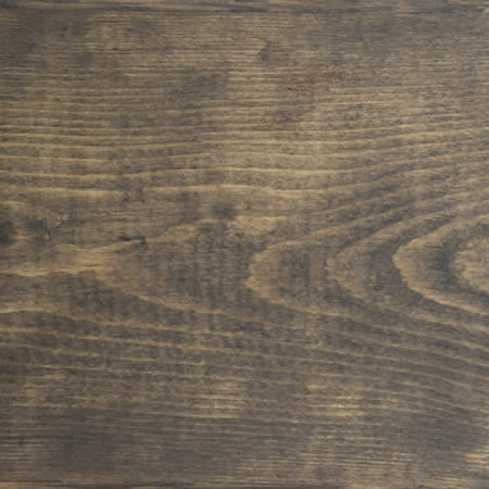 black ash finish cutek sample on brown pressure treated lumber