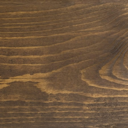 espresso finish cutek sample on brown pressure treated lumber