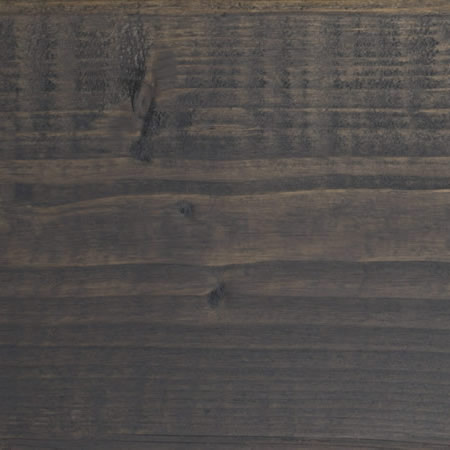 graphite grey finish cutek sample on brown pressure treated lumber