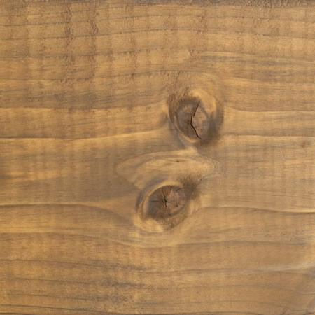 rustic gold finish cutek sample on brown pressure treated lumber
