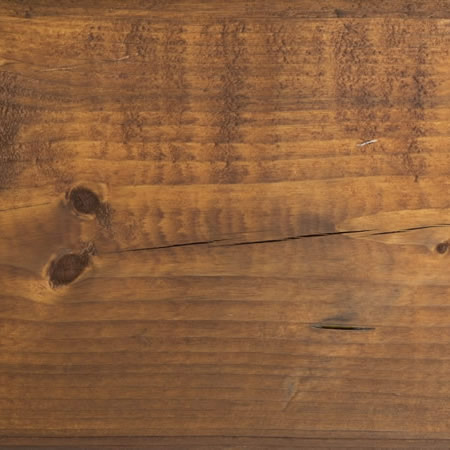 terra cotta finish cutek sample on brown pressure treated lumber