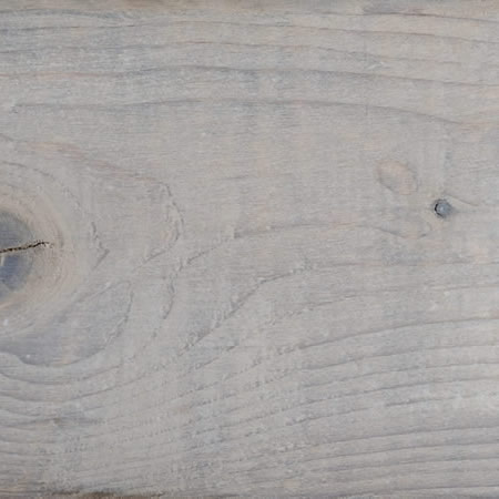 white wash finish cutek sample on brown pressure treated lumber