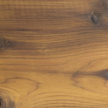 gold tone finish cutek sample on knotty Western Red Cedar