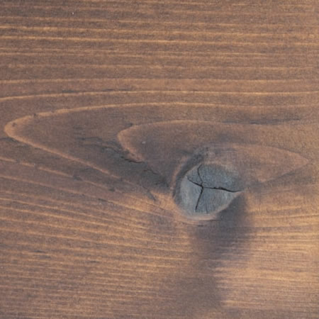 walnut finish cutek sample on knotty Western Red Cedar
