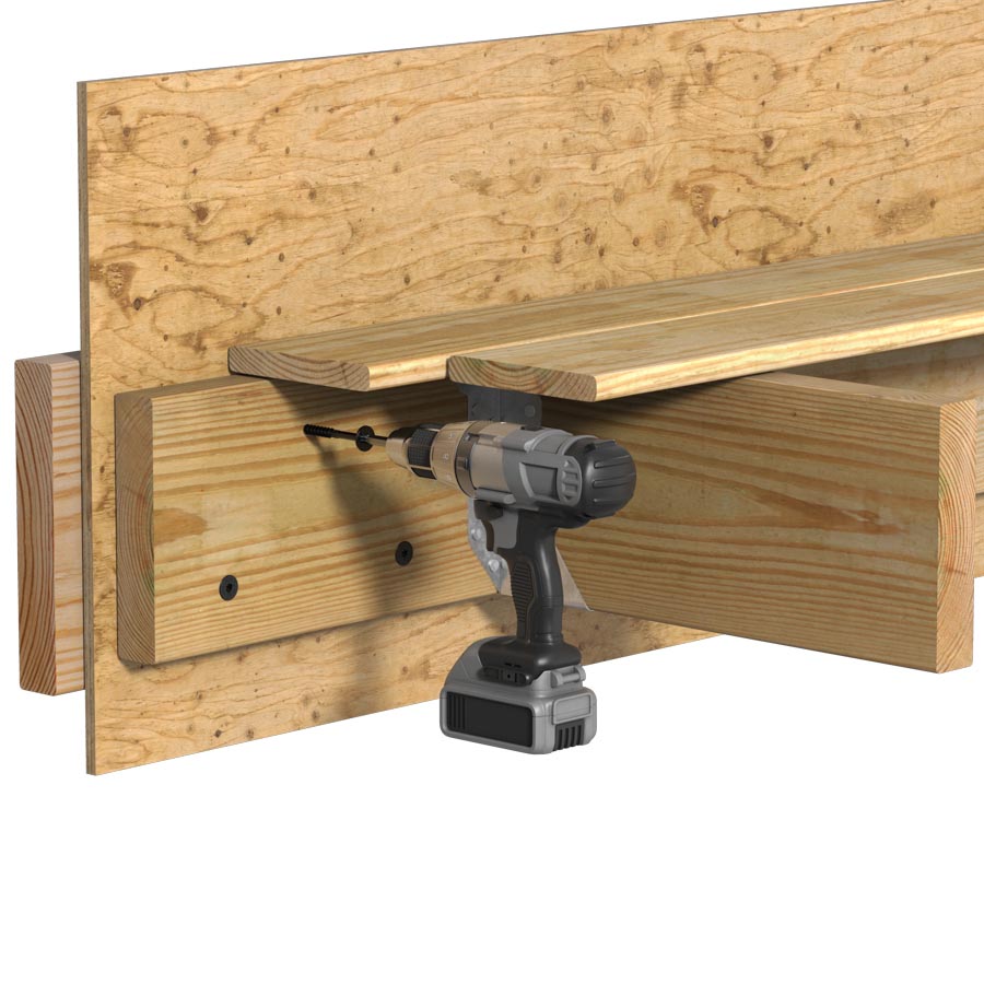 drilling a screw into boards